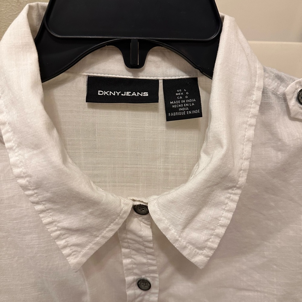 Women’s White DKNY button down shirt. Size L